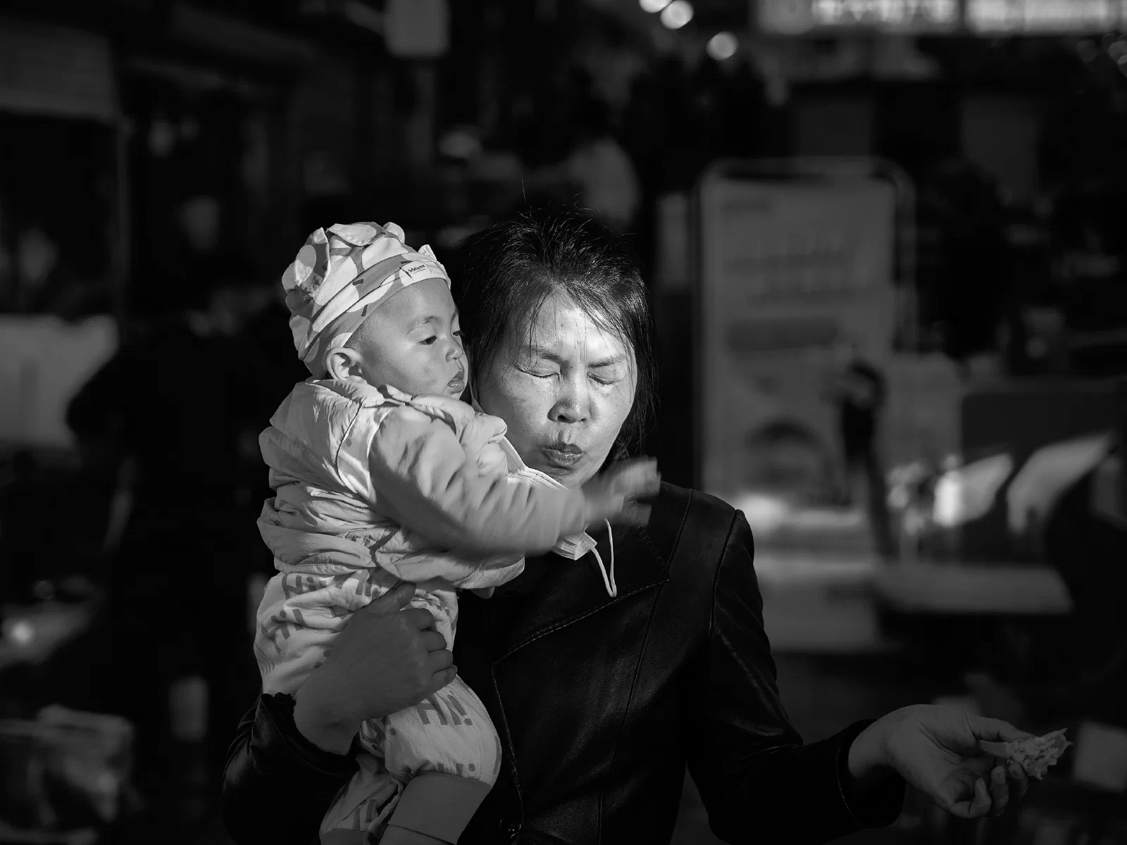 An adult holding a child