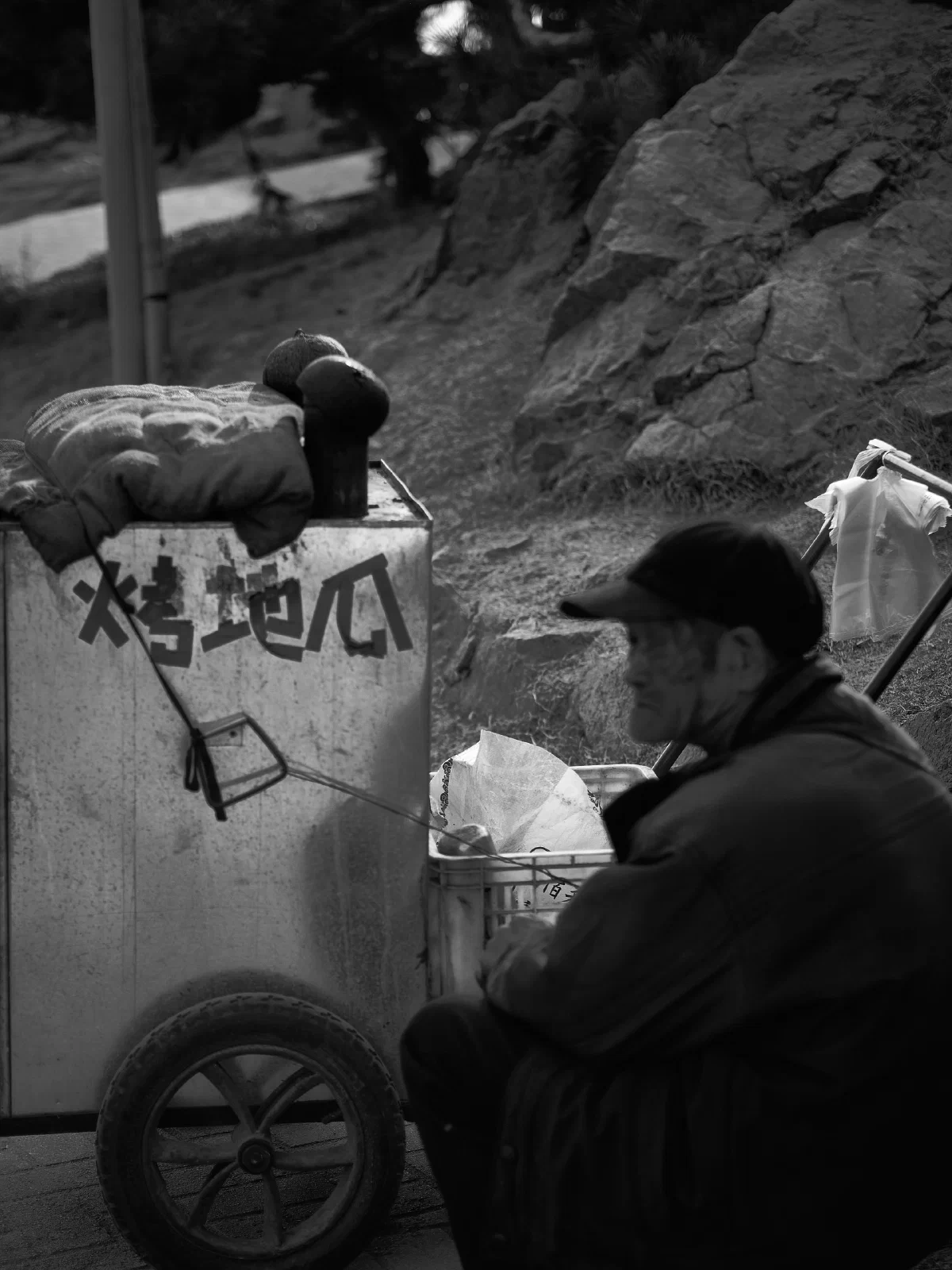 People and stalls by the street