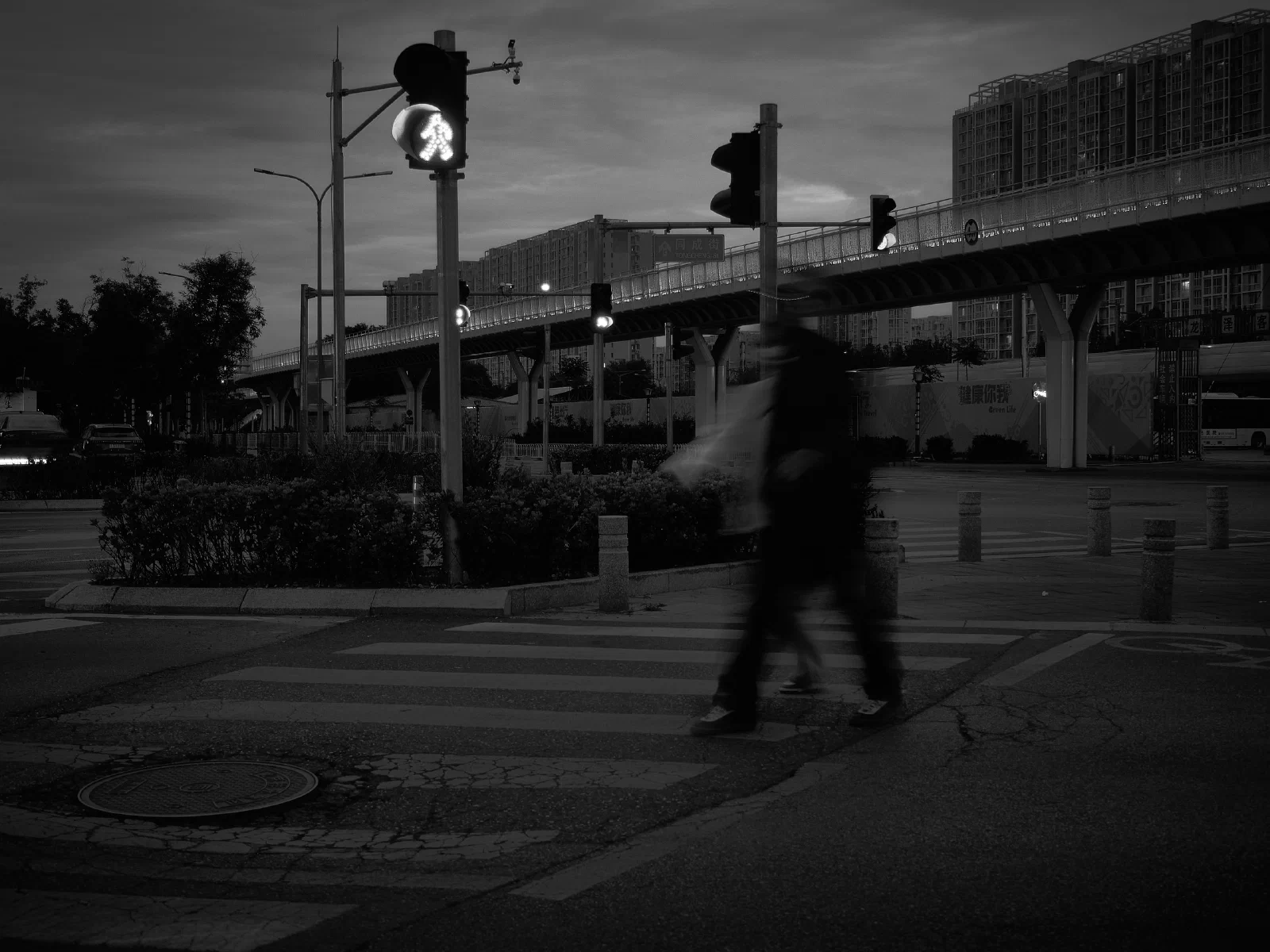 A solitary figure within a surrounding space