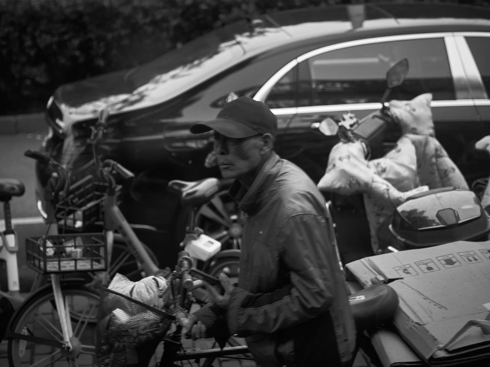 People and stalls by the street
