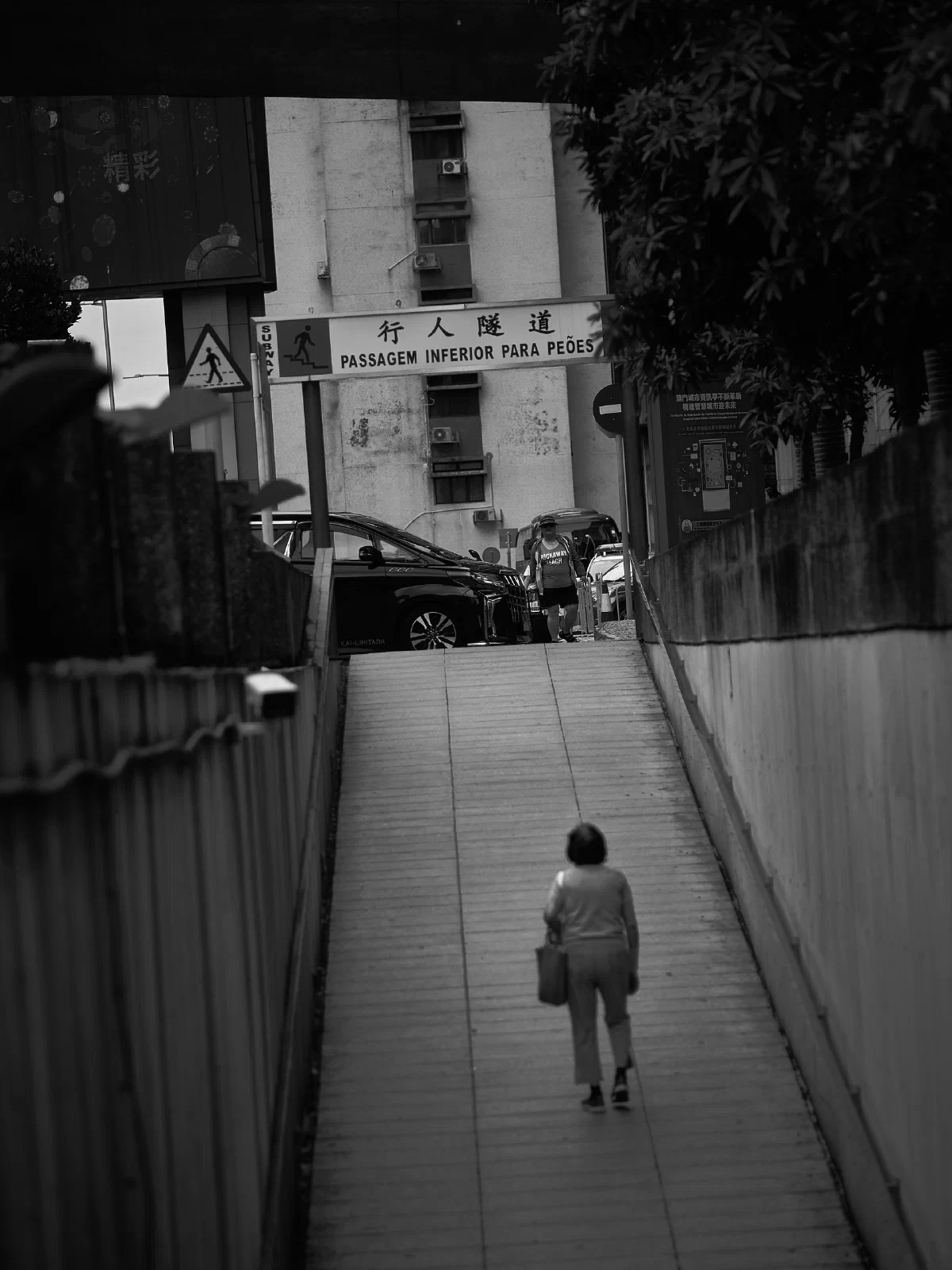 A solitary figure within a surrounding space