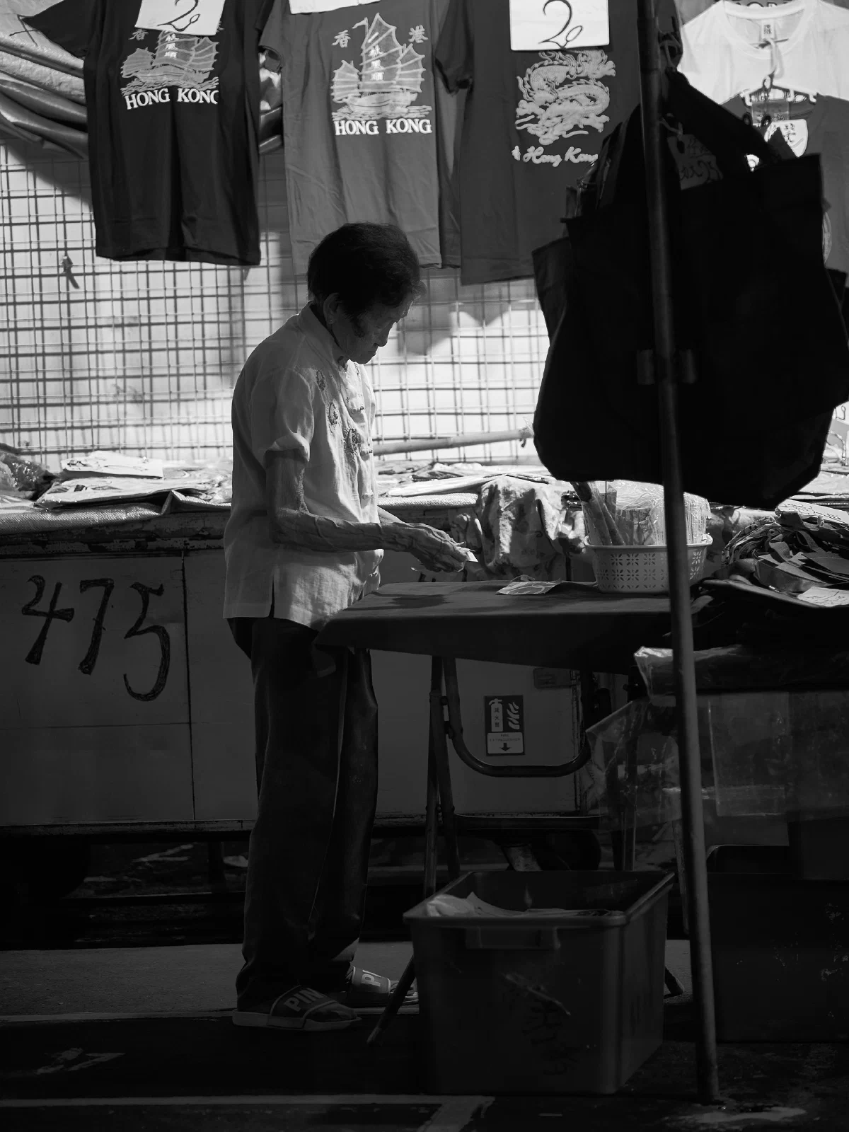 People and stalls by the street