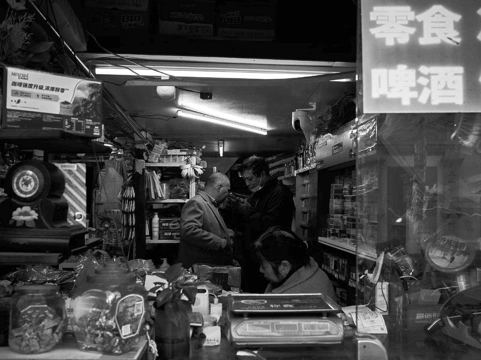 People and stalls by the street