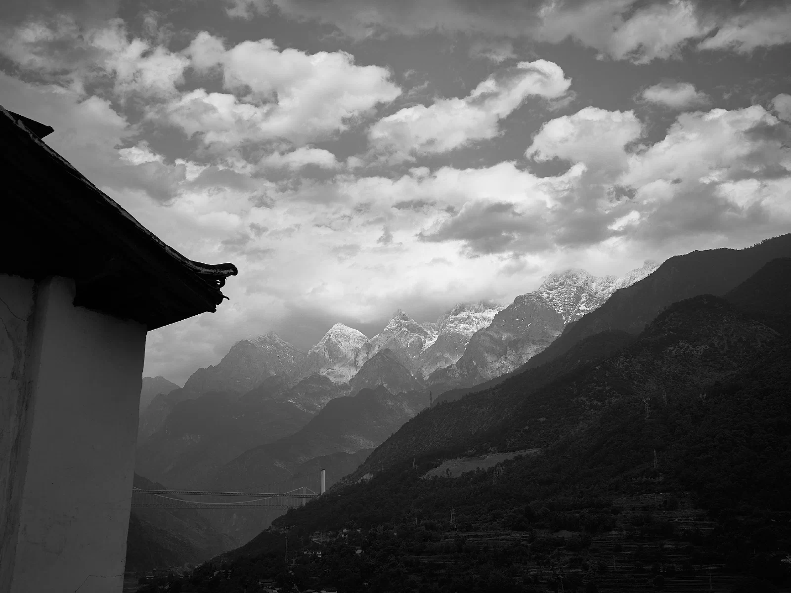 Mountains and valleys with buildings nearby