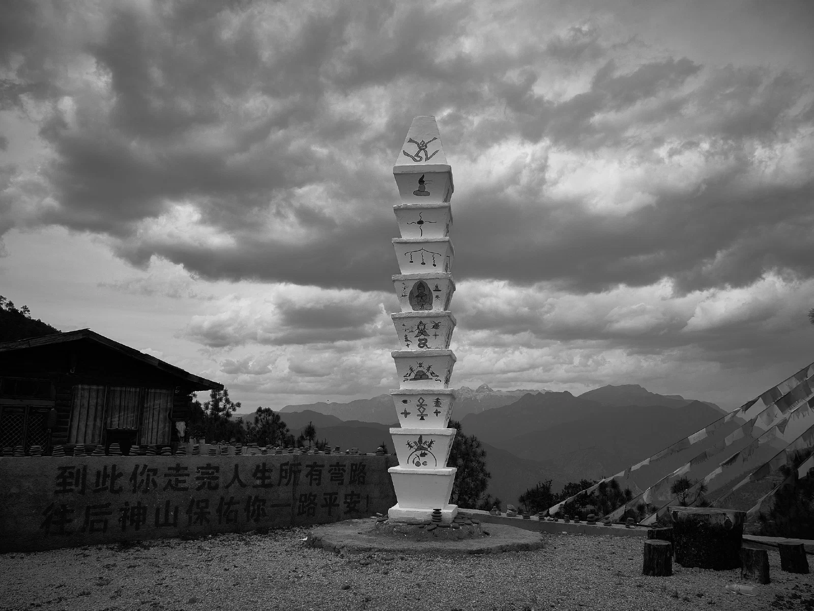Buildings with figures or vessels in an open space